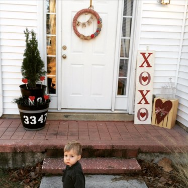 Squishy baby photo-bombing my Valentine's Day stoop photo :)
